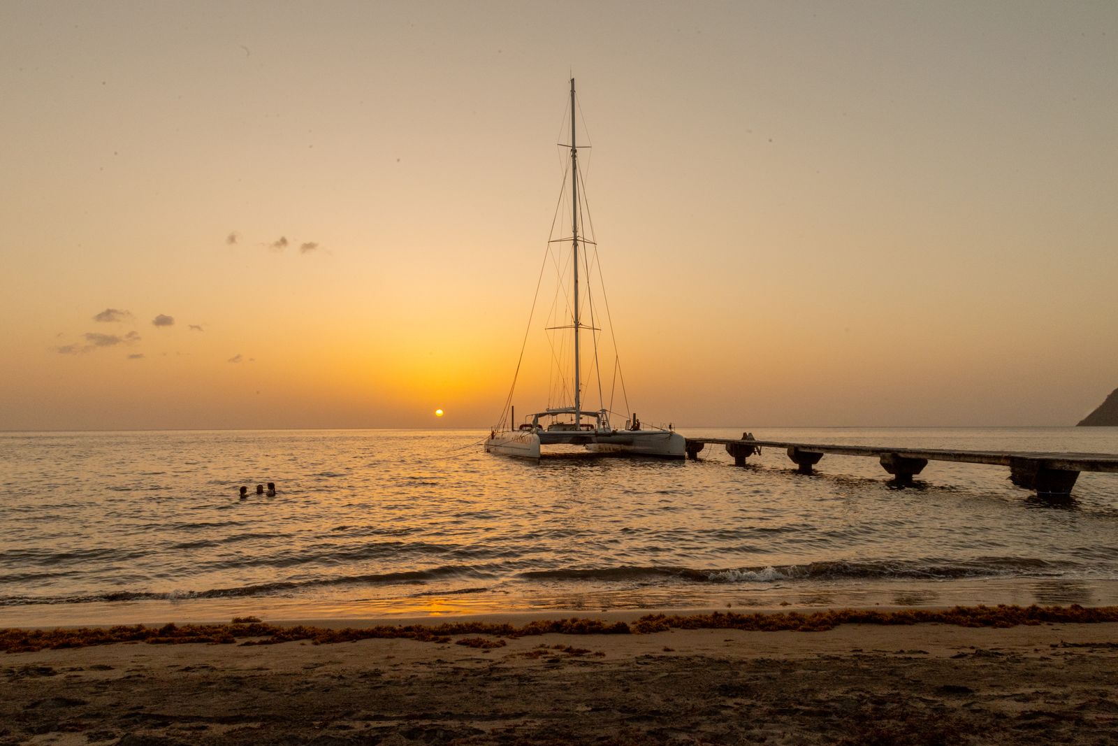 Yacht at sunset on the Dominica coast representing Saint George Parish