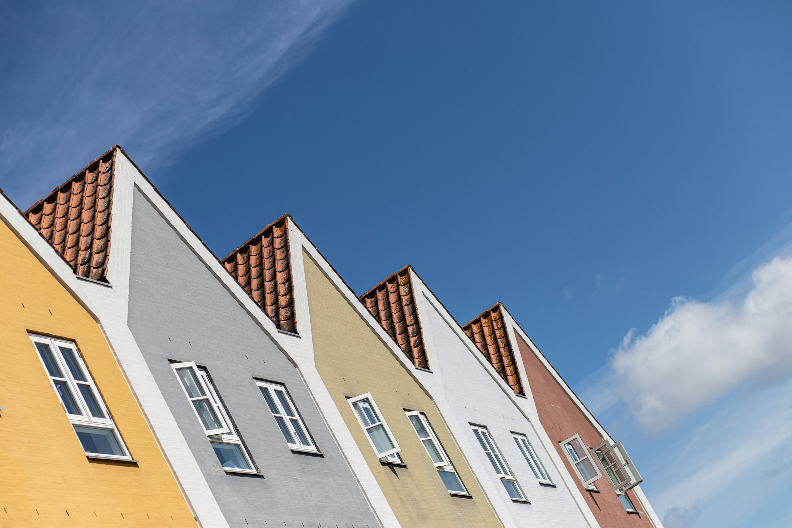 Colourful rooftops and traditional buildings in Odense on Funen, Denmark.