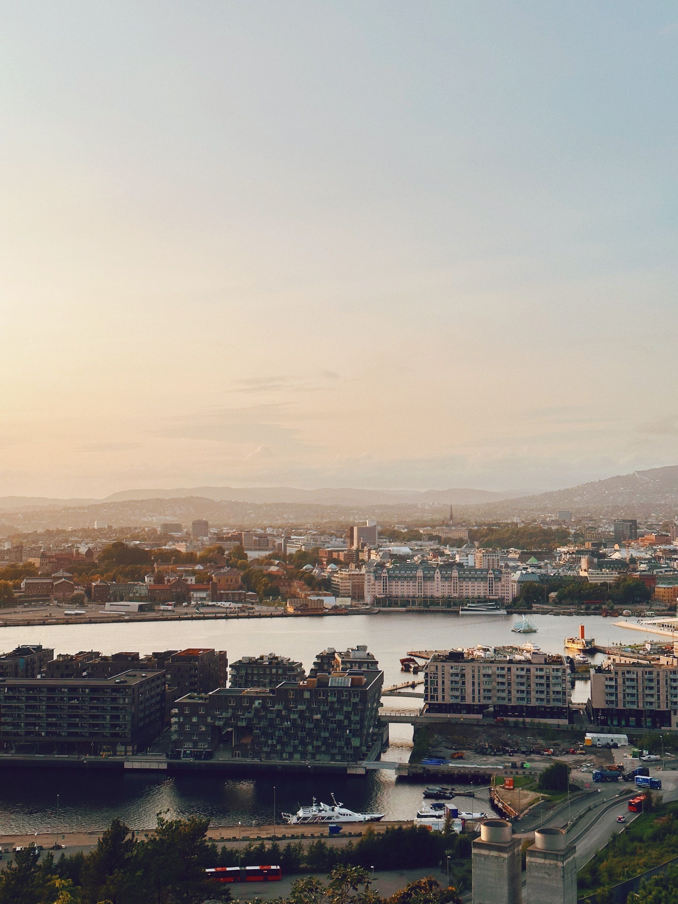 Aerial Oslo waterfront cityscape at sunset