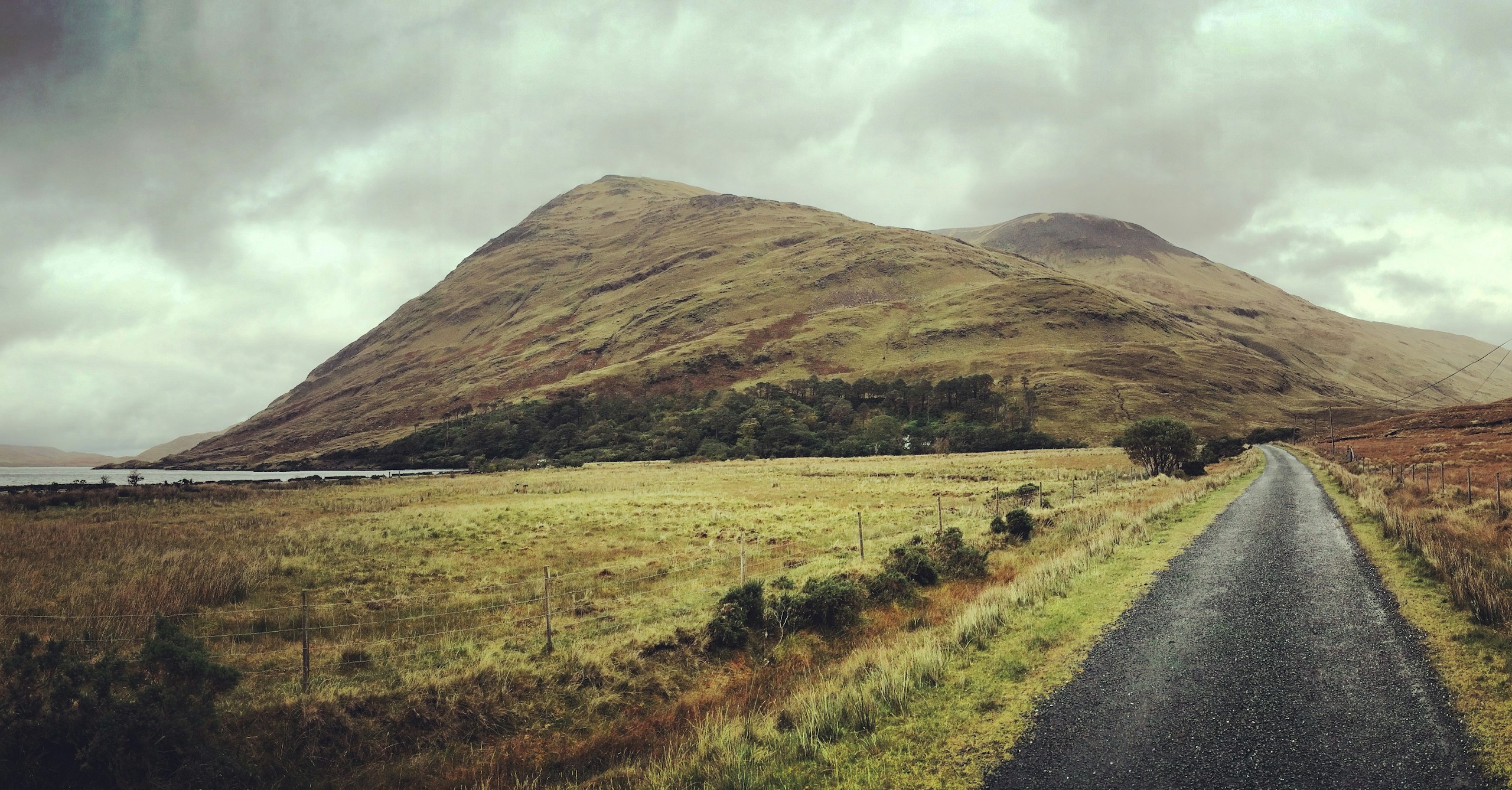 County Mayo road and mountain. Destination view for Mayo, Ireland.