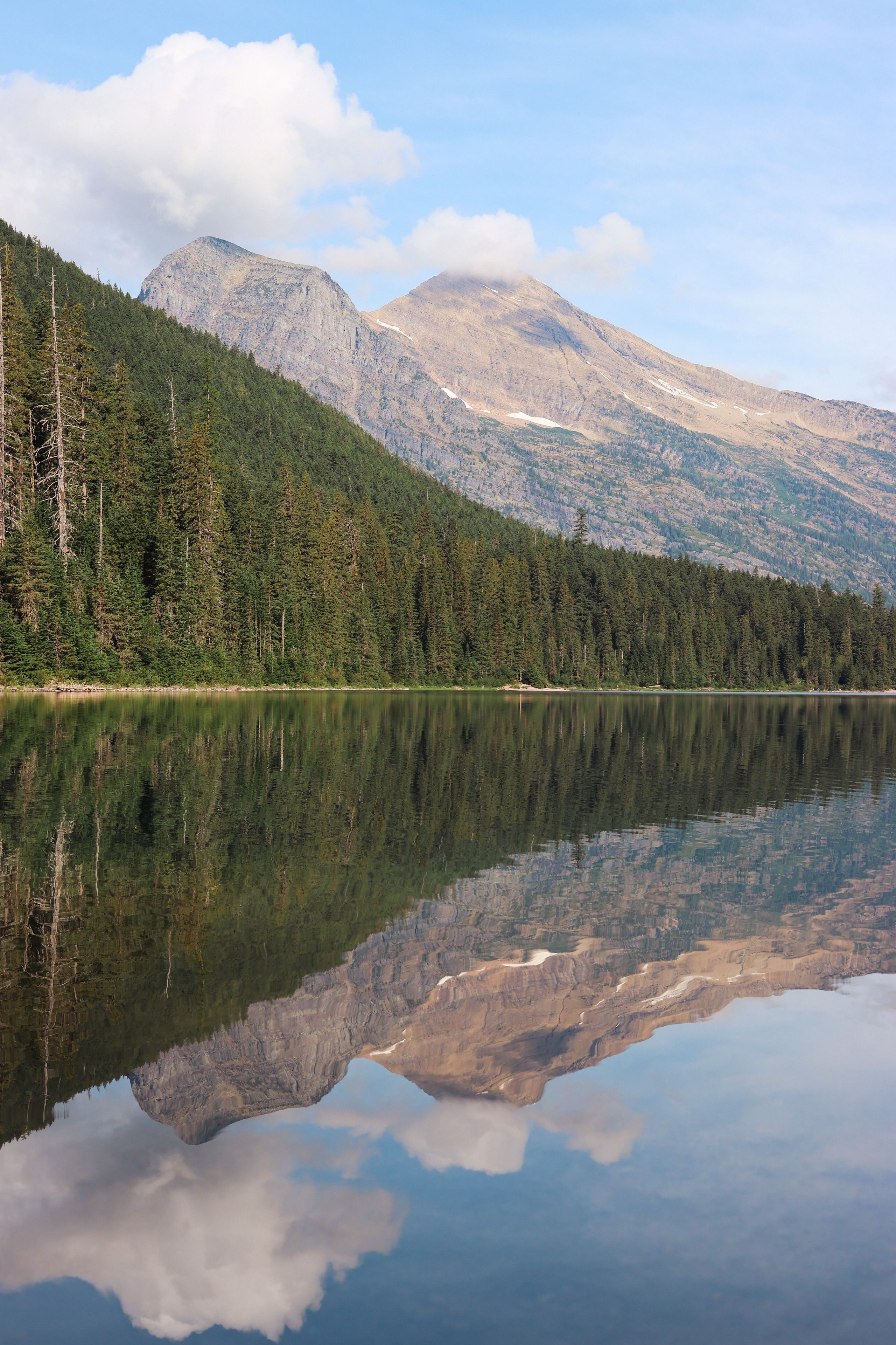 Lake reflecting surrounding landscape, United States