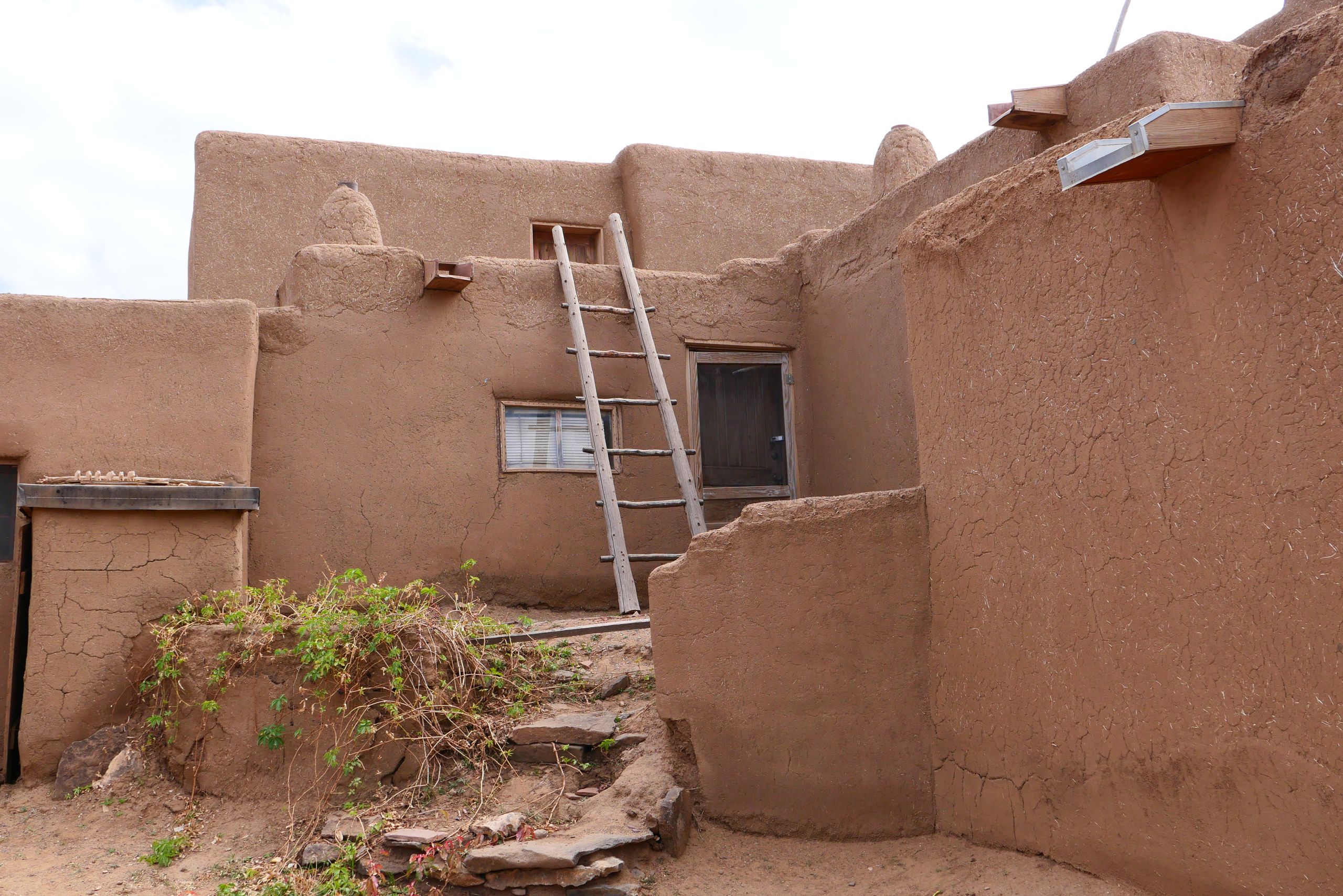 Historic adobe building at Taos Pueblo, United States